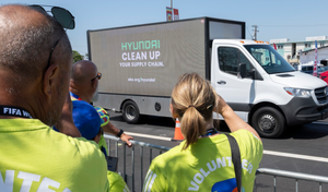 While Hyundai bets on World Cup ads to distract fans, a mobile billboard circling the auto giant’s HQ exposes staff and soccer crowds to what's really happening behind the wheel